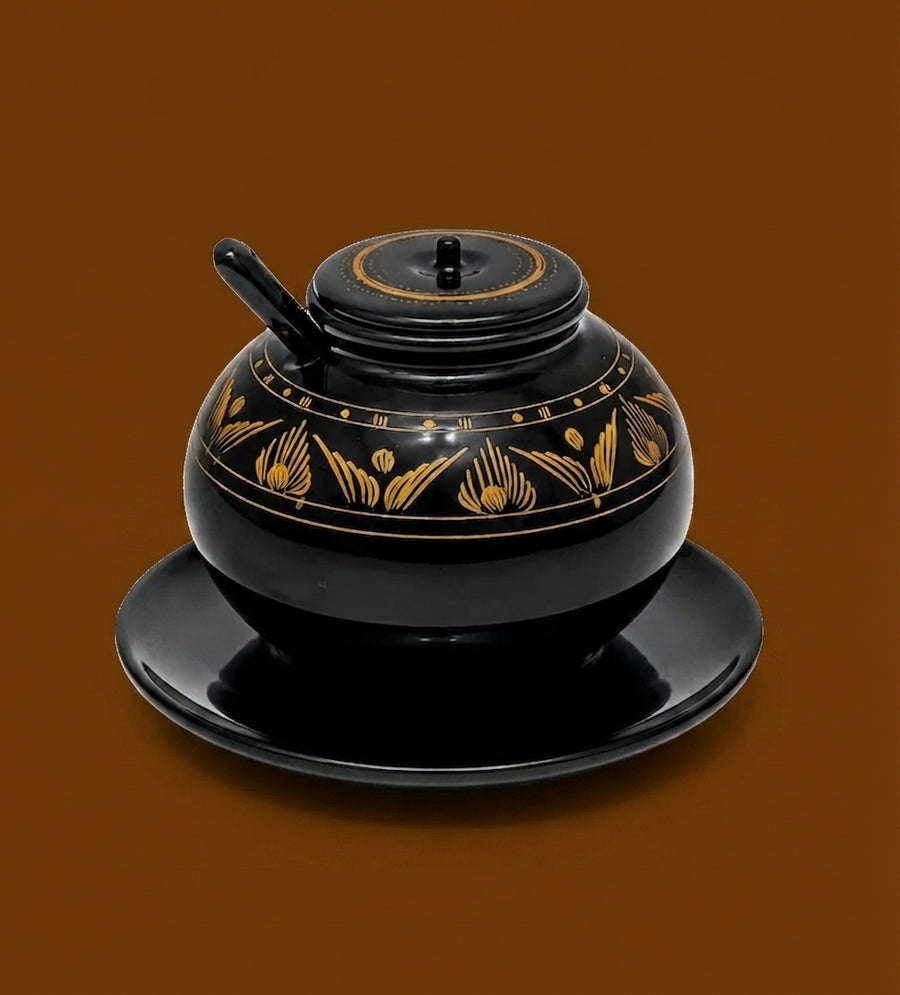 Small black wooden sugar port